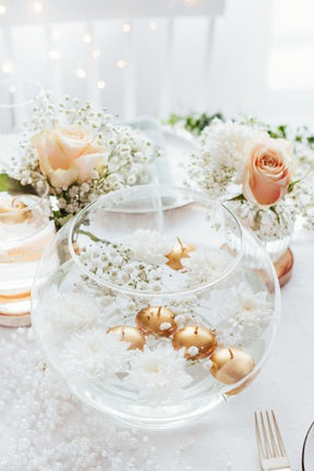 Drijfkaarsen Goud 4cm 50st van Partydeco koop je bij Partywinkel