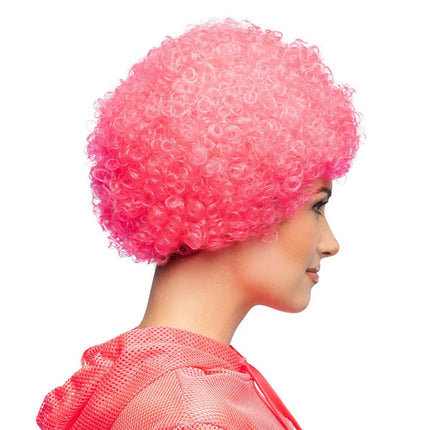Pruik Curly neonroze UV van Boland koop je bij Partywinkel