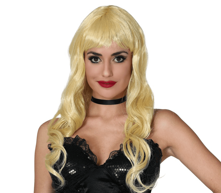 Pruik Lang Haar Krullend Blond van Fiestas Guirca koop je bij Partywinkel